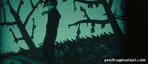 100 Years of The Cabinet of Dr. Caligari: Is It Still Relevant? 4 Still of Cesare moving across the stylized rooftops