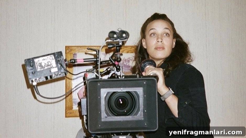 Interview with Mia Cioffi Henry on Sorry Baby Cinematography 3 Cinematographer of Sorry, Baby - Mia Cioffi Henry, posing with vintage camera | from https://www.miacioffihenry.com/