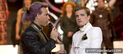 Top 10 Iconic Hunger Games Moments 4 Peeta on stage with Caesar Flickerman