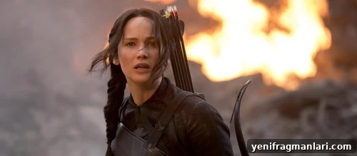 Top 10 Iconic Hunger Games Moments 5 Katniss addresses the camera in District 8
