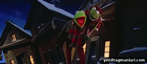 Bob Cratchit and Tiny Tim singing