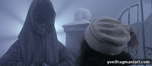 10 Unforgettable Muppet Christmas Carol Moments 6 The tall, hooded Ghost of Christmas Yet to Come looms from the mist