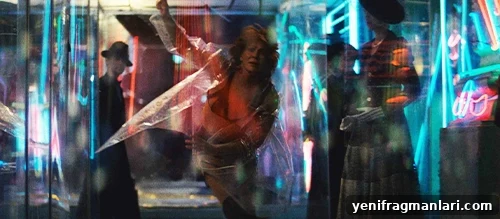 10 Iconic Blade Runner Moments 6 Zhora collapsing through glass amid neon lights