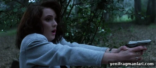 10 Iconic Heathers Moments You Can't Miss 7 Veronica in the woods with a gun