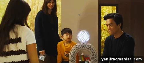 AfrAId 2024 Review: Features, Pricing, and Final Verdict 2 Katherine Waterston, John Cho and the cast of 'AfrAId' (2024) looking at a shining orb.