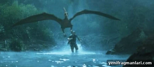 10 Iconic Dr. Alan Grant Moments from Jurassic Park 2 Alessandro Nivola being chased through water by a flying dinosaur.