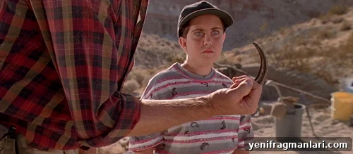 10 Iconic Dr. Alan Grant Moments from Jurassic Park 11 Sam Neill wields a Velociraptor claw to scare a child in 'Jurassic Park' (1993).