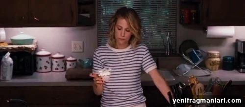 10 Unforgettable Bridesmaid Moments That Stole the Show 4 Kristen Wiig bakes a cupcake in 'Bridesmaids' (2011).