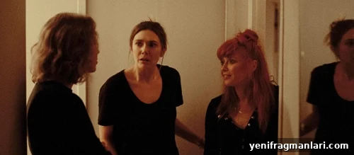 Carrie Coon, Elizabeth Olsen and Natasha Lyonne in 'His Three Daughters' (2024). 