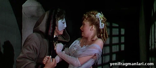 Claude Rains, masked, and Susanna Foster in the 1943 Universal Monsters version of 'Phantom of the Opera' (1943).