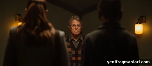 Heretic (2024) Review: A Twisted New Horror 2 Hugh Grant faces two young women in the 2024 horror feature film 'Heretic'.