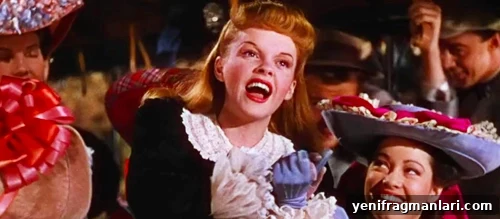 Meet Me in St. Louis at 80: Film Review and Legacy 2 Judy Garland overjoyed in the 1944 Vincente Minnelli feature film 'Meet Me In St. Louis'.