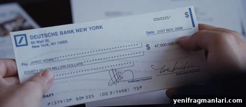 12 Days of Unchristmas: Alternative Holiday Traditions 11 A still of a cheque from 'The Big Short' (2016).