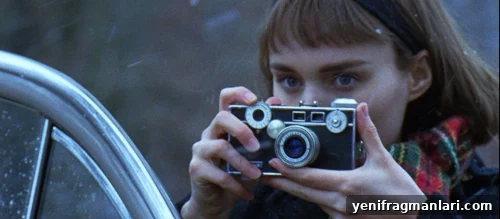 Carol (2015) Movie Review: Rooney Mara & Cate Blanchett 2 Rooney Mara holds a camera in the 2015 romance feature film 'Carol'.