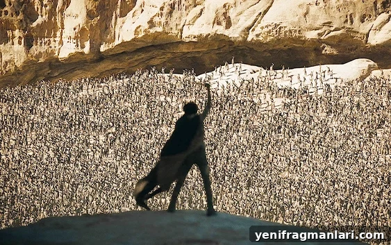 Joseph Wade's Top 10 Films of 2024 4 Timothee Chalamet raises a knife above his head to crowds of thousands in 'Dune: Part Two'.